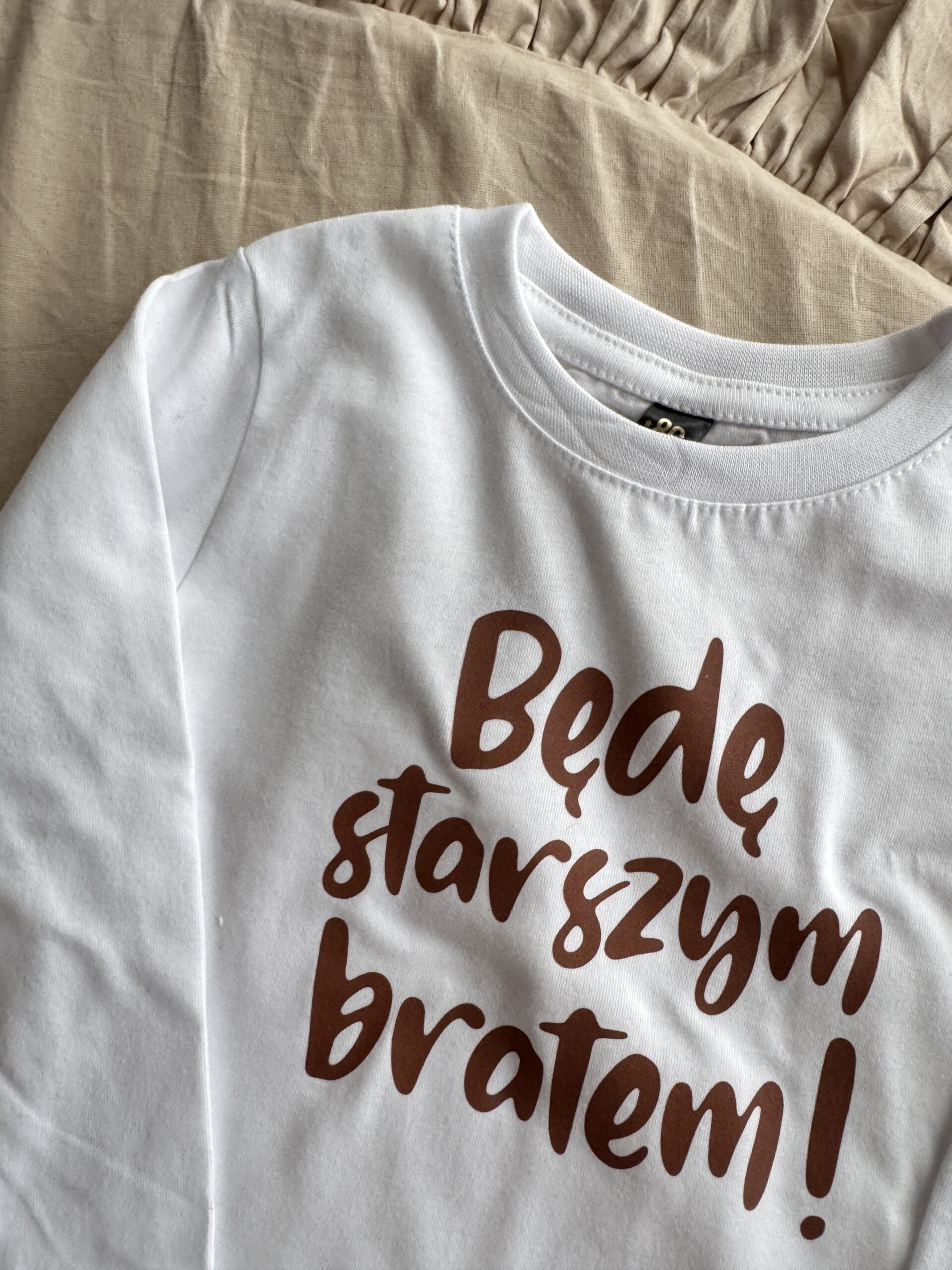 Koszulka biała z dlugim rękawem będę starszym bratem rozmiar 86