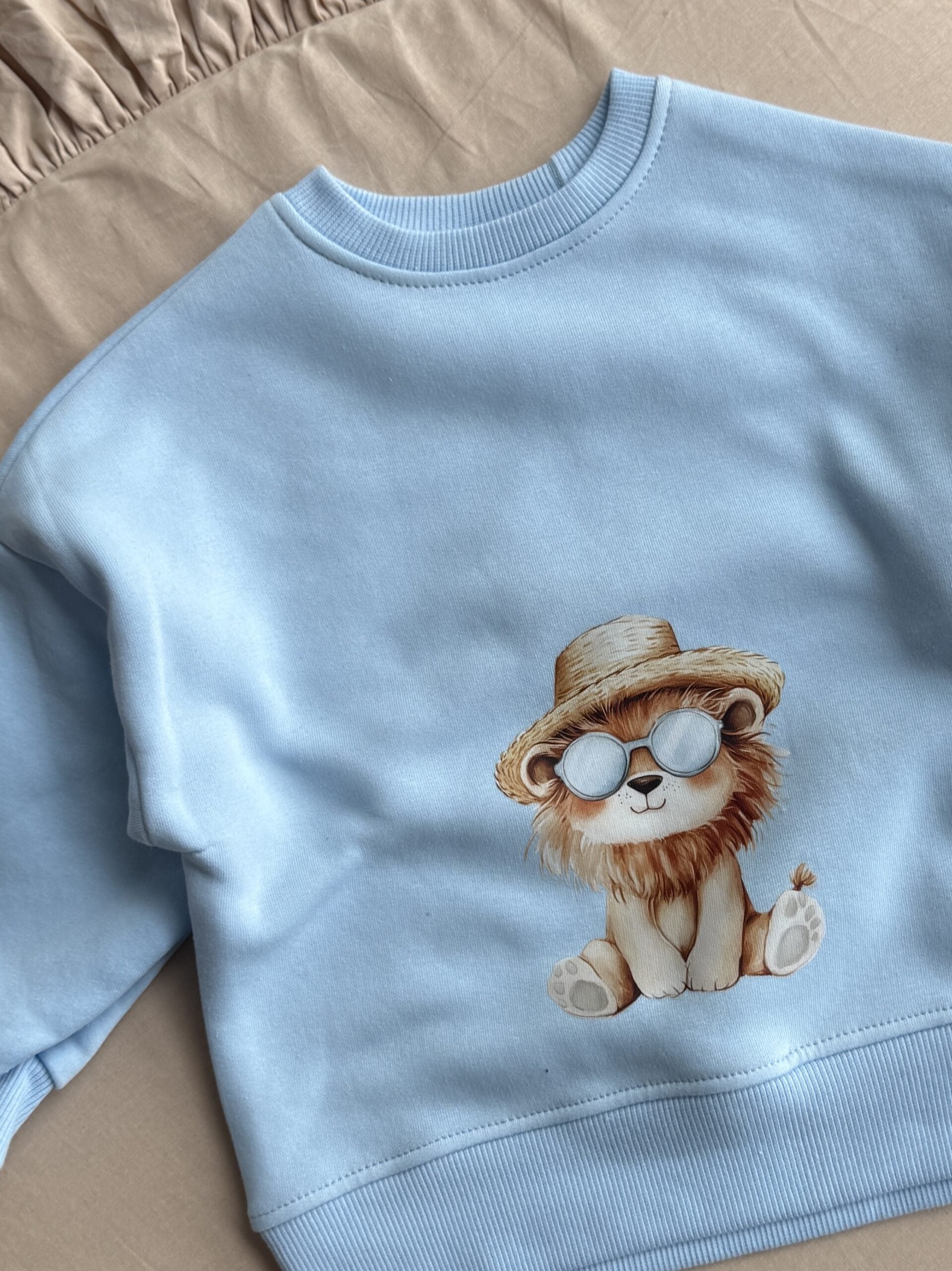 Bluza błękitna lew w kapeluszu rozmiar 98