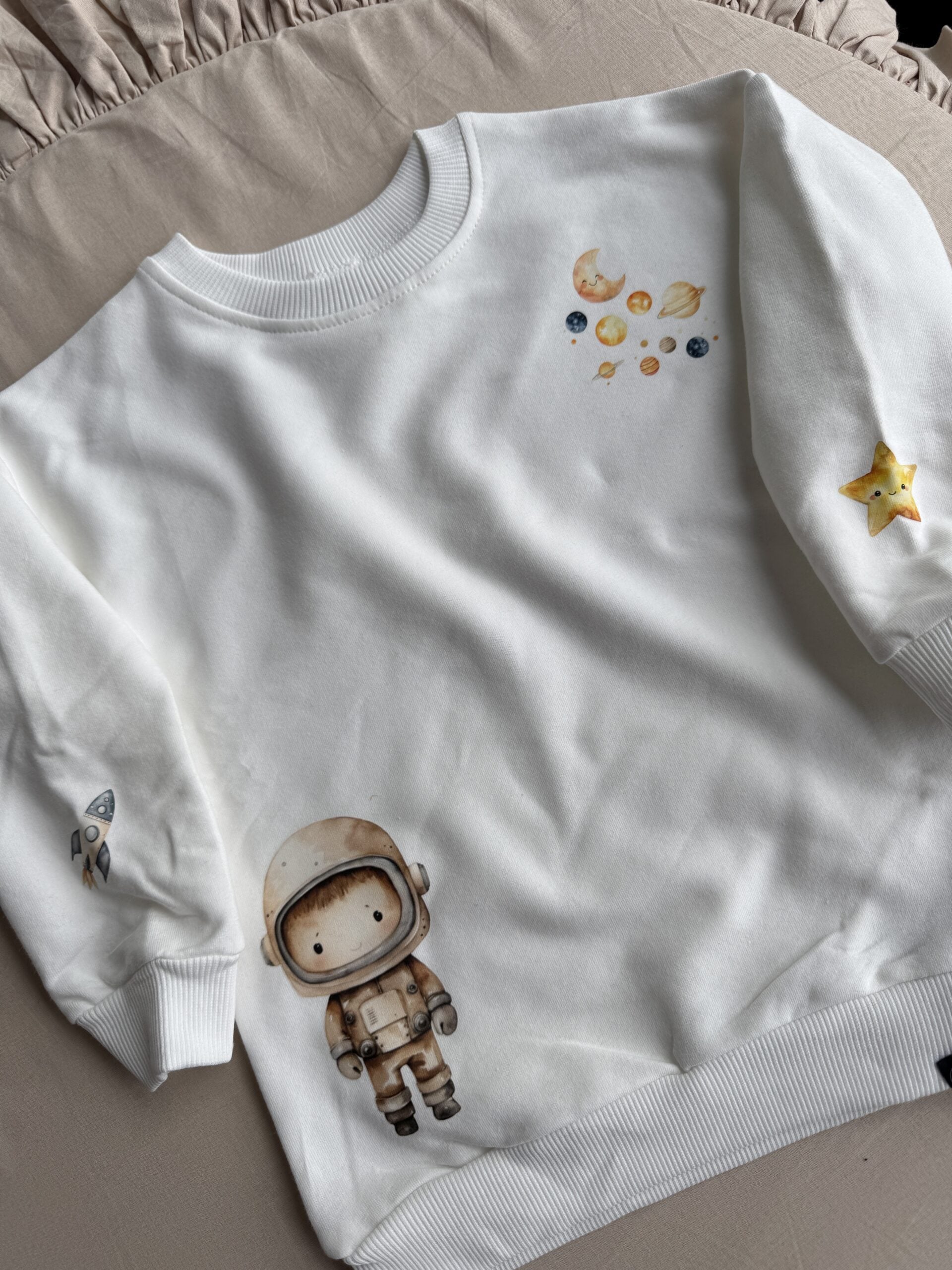 Bluza ecru kosmos rozmiar 98