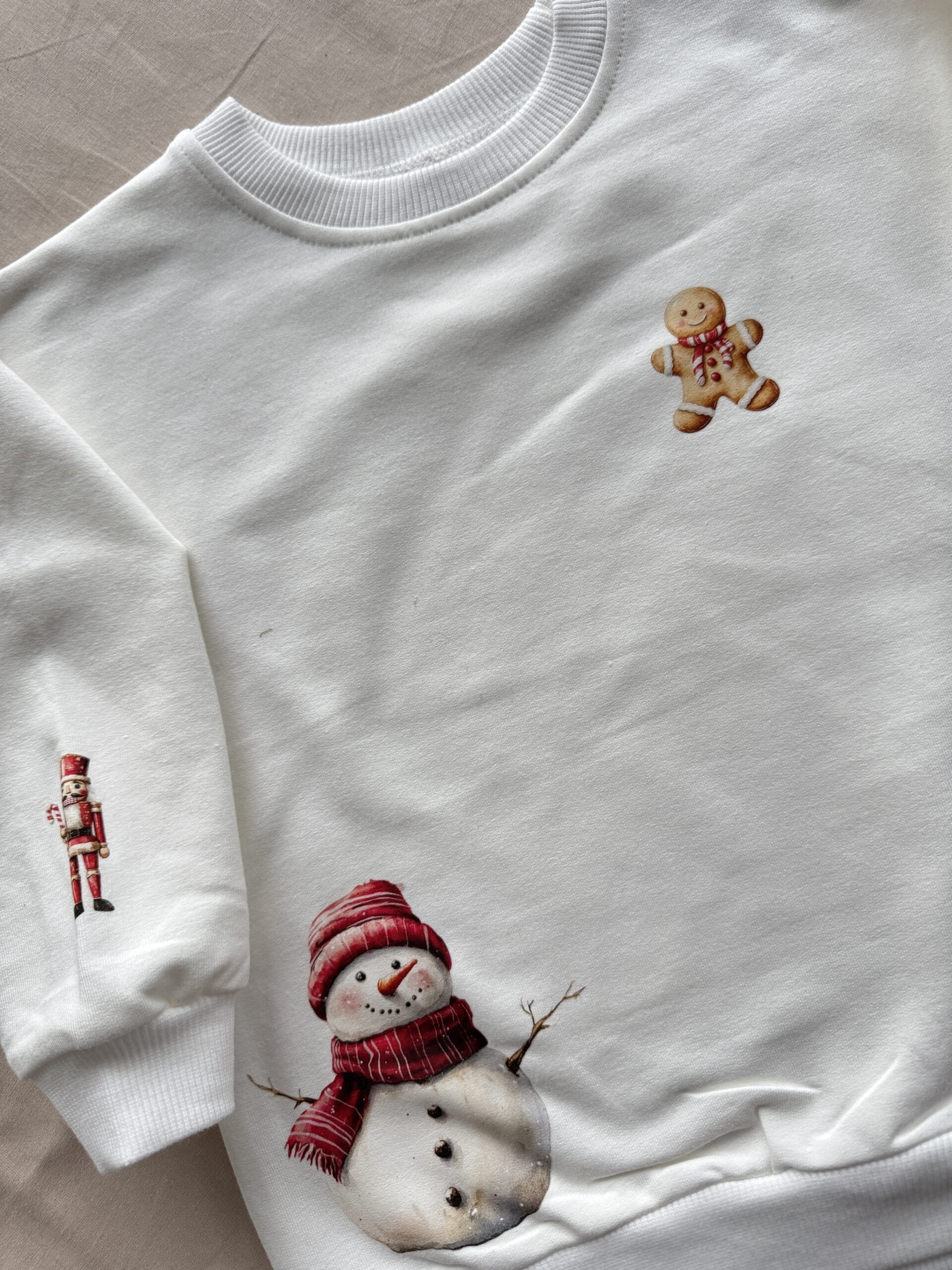 Bluza ecru dziadek do orzechów rozmiar 98