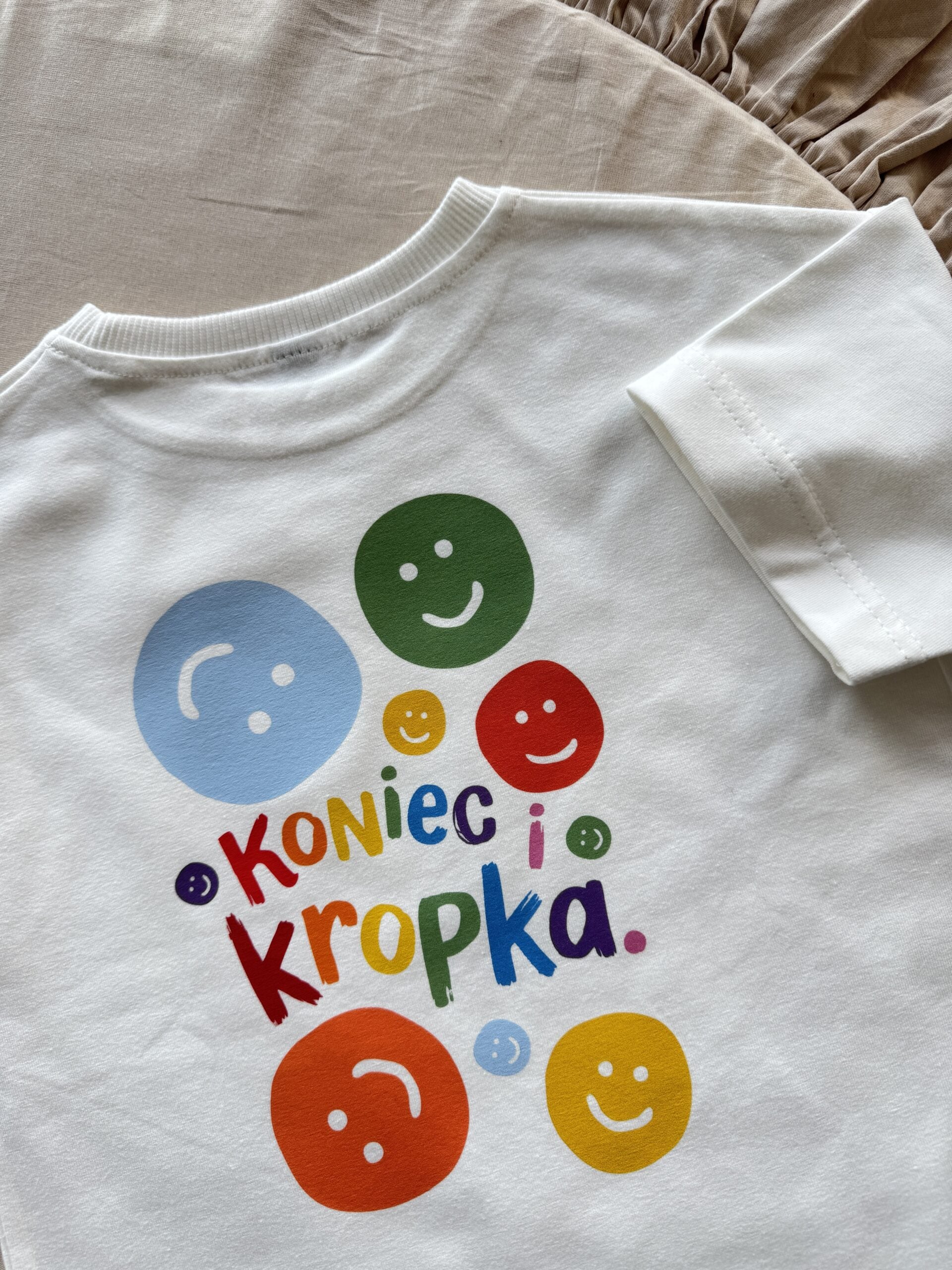 Koszulka ecru z krótkim rękawem koniec i kropka rozmiar 98